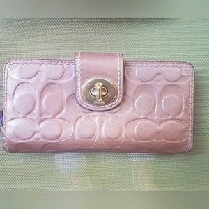 Leather Coach wallet.  Bronze colour
